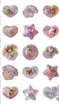 the teddy bears are in different shapes and sizes, including heart shaped balloons with stars on them