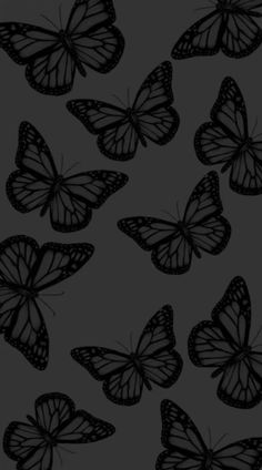 black and white butterflies on a gray background