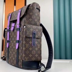 Features: M46272 Blending urban elegance with the rugged spirit of a hiking pack, this version of the Christopher Backpack is crafted in Monogram Macassar canvas with cowhide trim dyed a bold shade of purple, one of designer Virgil Abloh’s signature colors. With two side pockets and a special tablet computer compartment, it’s a functional and fashionable carry-all. 15 x 17.3 x 8.3 inches (length x Height x Width) W 38 cm x H 44 cm x D 21 cm Monogram Macassar coated canvas and Purple cowhide leat Designer Backpack In Signature Coated Canvas, Lv Backpack Men, Luxury Backpack Louis Vuitton, Louis Vuitton Supreme Backpack, Lv Montsouris Backpack, Cm Monogram, Hiking Pack, Tablet Computer, British Fashion