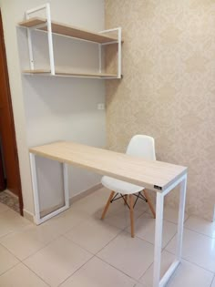 a white desk and chair in a room