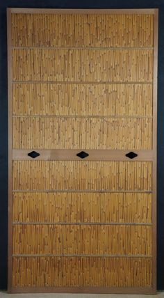 an image of a bamboo door that is made to look like it has been painted