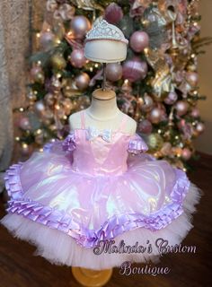 Pink and purple ballerina dress with matching pearl tiara . It's a short upper thigh cut with full fluffy layers of tulle . Purple trimmed details and great for any event. Shades of purple may be adjustable as ribbon available may not be exact shade but close. Pink Fitted Fairy Dress For Costume Party, Lavender Fitted Princess Dress For Dress-up, Balletcore Party Fairy Dress With Ruffles, Balletcore Fairy Dress With Ruffles For Party, Pink Fitted Fairy Dress For Parties, Fitted Pink Fairy Dress For Party, Party Ballet Tutu Dress With Ruffles, Princess Style Lavender Fairy Dress For Party, Pink Fitted Tutu Dress For Costume Party