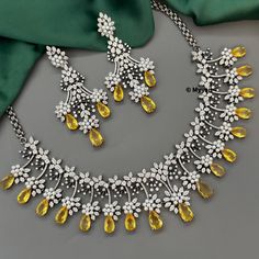 Yellow diamond, pearl and doublet stone statement necklace in victorian finish. Inspire your style with designer statment necklace made from premium quality pear cut doublet stone with diamond and pearl details  Pair this beautiful necklace with Wedding gown, indian gown, sarees or indowestern attire to complete your look.  All orders Ship same day if placed before 4:00 PM EST  Necklace length: 15-17 inch Create beautiful memory for any occasion with elegant jewelry for your loved ones We will b Diamond Pearl Necklace Set, Statment Necklace, Indian Gown, Gown Indian, Stone Statement Necklace, Pearl And Diamond Necklace, Pearl Details, Pearl Necklace Set, Stone Choker