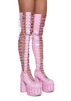 will have ya feelin' the moonlight magic. Embrace the lunar hour in these thigh high lace-up boots that have a vegan leather construction,a vinyl fashion, side zip closures, and exxtra high platforms with chunky block heels. Pink Faux Leather Party Boots, Trendy Pink Lace-up Boots, Pink Fitted Faux Leather Boots, Edgy Pink Party Boots, Trendy Lace-up Boots For Alternative Fashion, Edgy Pink Boots For Spring, Pink Synthetic Platform Boots For Party, Pink Platform Boots, Lace Up Platform Boots