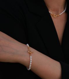 Hand crafted using fresh water pearls. The pearl toggle bracelet is just what you expect to put on with your dress, shirts... It will add elegant and delicate tough to your whole look. Wear it with our fresh water Pearl Toggle Necklace. 4mm*5mm fresh water pearls 18k gold plated toggle 6.5" Everyday Pearl Jewelry With Toggle Clasp, Elegant Bracelet With Toggle Clasp, Elegant Toggle Clasp Bracelet, Elegant Adjustable Bracelet With Toggle Clasp, Elegant Pearl Necklace With Toggle Clasp, Elegant Everyday Pearl Bracelet, Elegant Wedding Jewelry With Toggle Clasp, Water Pearl Necklace, Toggle Necklace