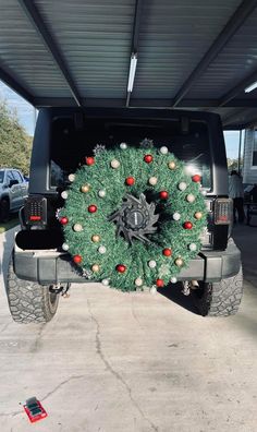 a truck with a wreath on the back of it