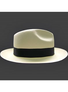 Brand: Gamboa PremiumColor: Natural Material: Toquilla Straw Brim: 7 - 8 cm. (2.76"- 3.16")Grade: 19 - 20 (Fine Fine)learn more Sweatband: Cotton Twill, 3 cm. (1.18") Crown: 10.37 - 10.87 cm. (4.1" - 4.3") Ribbon: Linen Description: A luxurious hat, handmade in Montecristi, the worldwide famous Panama Hat town in Ecuador. This Panama Fedora hat (Tuis) is a top quality, classic and elegant hat. Each hat is individually blocked and trimmed to meet the highest quality standards.Each Gamboa Premium White Flat Brim Fedora For Formal Occasions, Classic Formal Panama Hat In Toquilla Straw, Luxury Wide Brim Panama Hat For Formal Occasions, White Brimmed Panama Hat For Formal Occasions, Elegant Formal Fedora In Toquilla Straw, Luxury Formal Wide Brim Panama Hat, Formal Luxury Flat Brim Panama Hat, Luxury Formal Panama Hat With Flat Brim, Luxury Fitted Panama Hat For Formal Occasions