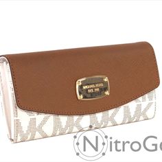 Michael Kors Jet Set Slim Flap Wallet Brand New Sealed With Tags Model: 35h5gjse7t * Saffiano Leather And Mk Signature Pvc * Full Length Slip Pocket On Exterior Rear * Gold Tone Mk Logo Plate On Front * Fold Over Flap Closure With Metal Snap * 2 Slip Pockets Under Flap * Interior Lining In Tan Logo Fabric And Brown Leather * Full Length Zipper Pocket With Leather Pull With 2 Slip Pockets * 1 Full Length Slip Pockets And 6 Card Slots * Color: Vanilla/Acorn * Measurements: 7½" W X 4" H X 1½" D Classic White Wallet For Travel, Elegant Everyday Wallets With Logo, Elegant Wallets With Logo, Elegant Travel Wallet With Logo, Michael Kors White Rectangular Wallet, Michael Kors White Everyday Wallet, Michael Kors White Wallets, Everyday Michael Kors White Wallet, White Leather Travel Wallet