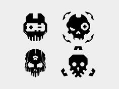 four skulls with different designs on them