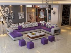 a modern living room with purple and white furniture