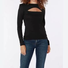 Lulu's Flirty Little Secret Black Ribbed Cutout Long Sleeve Top. Flattering Ribbed Fabric Hugs Your Curves Sultry Cutouts Add A Flirty, Alluring Touch Long Sleeves Keep You Cozy While Looking Hot Versatile Style Goes From Day To Night This Top Is The Ultimate Wardrobe Essential For The Confident, Stylish Woman. The Ribbed Material Smooths And Shapes Your Figure, While The Daring Cutouts Draw The Eye And Leave A Lasting Impression. Pair It With High-Waisted Jeans And Heels For A Night Out, Or Dre Fitted Black Top With Cutout, Black Cutout Tops For Night Out, Cutout Tops For Party In Fall, Fall Party Tops With Cutout Details, Black Long Sleeve Cutout Top, Black Long Sleeve Tops With Cutout, Trendy Cutout Tops For Fall, Black Long Sleeve Top With Cutout, Cutout Long Sleeve Top