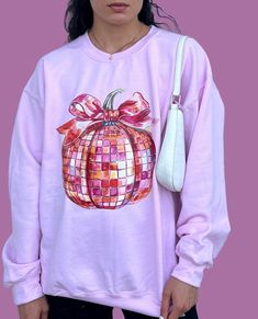 This Cute and Comfy Halloween Sweatshirt its the perfect addition to your fall weather or Halloween event. It's very cute and girly for my halloween fall girlies, look cute in our Pumkin ribbon or bow and get to look coquette and chick this holiday season.  * S I Z I N G * ♥️ Sizing is unisex so runs like men's, though not overly large ♥️Most women find their typical size works best. ♥️ Please see size guide in last listing photo for all measurements and information ♥️ 100% Soft cotton ♥️Design Fun Fall Tops With Cartoon Print, Pink Cartoon Print Sweatshirt For Fall, Pink Tops With Cartoon Print For Fall, Pink Cartoon Print Tops For Fall, Cute Cartoon Print Fall Sweatshirt, Cute Cartoon Print Sweatshirt For Fall, Coquette Clothes, Halloween Coquette, Its Fall Yall