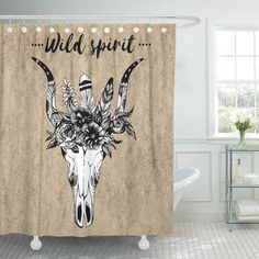 a shower curtain with an image of a deer skull and flowers on it's head