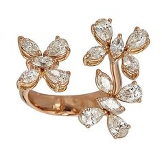 This exquisite 18kt gold ring features 2.79cts of sparkling marquise and pear shaped diamonds arranged as three beautiful flowers. This ring is available in rose, yellow or white gold. Handcrafted in Italy by ZYDO Italian Jewelry.Diamond Quality: Color F, Clarity VSDiamond Carat Weight: 2.79Dimension: Width: 1 in. Butterfly Diamond Ring, Jewelry Photography Styling, Chrome Nail, Gold Rings Fashion, Italian Jewelry, 18k Gold Jewelry, Floral Jewellery, Fine Jewellery, Abu Dhabi