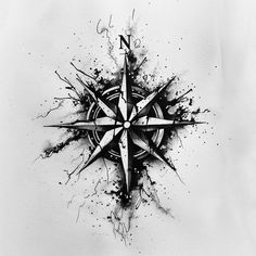 a black and white drawing of a compass with ink splatters on it's surface