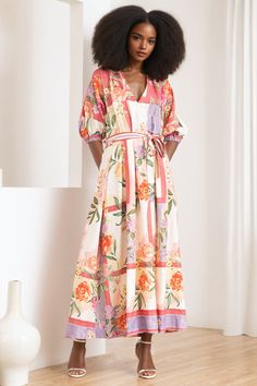 Embrace the essence of spring with our sophisticated linen wrap dress, featuring a charming vintage floral and border print. Perfectly tailored for a seamless transition from desk to date, this dress boasts a flattering silhouette that complements every figure. Experience elegance and versatility wrapped into one, making it the quintessential choice for both workday sophistication and evening allure. LENGTH: 54 1/2" from top of shoulder FABRICATION: 100% Linen STYLE#. DR-21294 MAYFAIR GARDEN- MA Floral Print Linen Dresses For Brunch, Multicolor Linen Floral Print Dress, Multicolor Linen Dress With Floral Print, Multicolor Floral Linen Dress, Brunch Floral Print Linen Midi Dress, Multicolor Linen Spring Dress, Spring Multicolor Linen Dress, Linen Wrap Dress, Seamless Transition