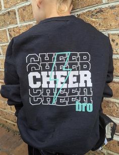 Kids Cheer Bro sweatshirt. Large logo on back of shirt. Can add small logo onto front. These are for kids sizing. School Fleece Tops With Letter Print, School Fleece Sweatshirt With Letter Print, Fleece Crew Neck Tops For School, Black Sweatshirt For School Spirit Streetwear, Black Sweatshirt For Streetwear With School Spirit, Team Spirit Fleece Crew Top, School Fan Apparel Sweatshirt With Letter Print, Black Crew Neck Hoodie For School Spirit, School Spirit Long Sleeve Sweatshirt With Logo