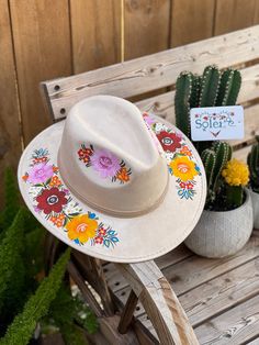 This Mexican Suede Hat is perfect to add that special touch to any outfit. This Mexican Hat is completely hand painted and one of a kind! This structured suede hat has a high crown and a teardrop top. The wide brim is accented by a band. The hat is made in Mexico by artisanal hands made with love for you to look gorgeous and fashionable. Hand Painted Flat Brim Hats For Country Events, Hand Painted Curved Brim Hats For Festivals, Hand Painted Curved Brim Hat For Festival, Hand Painted Hats With Curved Brim For Festivals, Hand Painted Curved Brim Festival Hats, Hand Painted Flat Brim Hats For Spring, Country Style Hand Painted Hat With Curved Brim, Custom Hand Painted Wide Brim Hat, Spring Hand Painted Flat Brim Hats