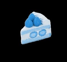 a piece of cake with blue frosting and paw prints on it's side