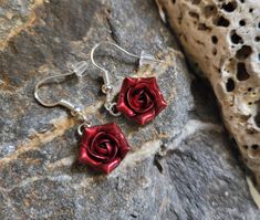 Dangly floral earrings with bloody red pearl roses and free hooks. The flowers are made from polymer clay with red pearl cover. Dia flower approx 12-13 mm Hooks - gold plated stainless steel or gold plated sterling silver 925 Material of flowers- polymer clay. Polymer clay isn't afraid of water, strong, but you must take care as any jewelry piece. Gorgeous gift for women and girls as handmade item. Sizes: Length of earrings- 1 in/ 25 mm Dia of charm 13-15 mm/ 0.5-0.6 inches across If you like th Rose Flower Earrings As Gift, Handmade Rose Flower Earrings Gift, Handmade Rose Flower Earrings For Gift, Rose Valentine's Day Earrings Gift, Red Flower Earrings With Ear Wire For Gift, Flower Shaped Earrings With Rose Design For Gift, Flower-shaped Rose Design Earrings For Gift, Flower Shaped Rose Design Earrings For Gifts, Rose Red Valentine's Day Earrings With Rose Design