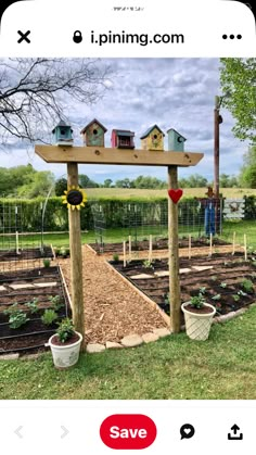 an image of a garden with bird houses on the top and plants in the bottom