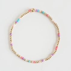 Colorful Beaded Bracelet, Miyuki Seed Beads Bracelet, Gold Bracelet Stack, Stacking Bracelet 2mm I added a pop of color to my Classic gold bead bracelet and it is the perfect addition to a dainty stack this spring/summer season. The beads are strung on a premium stretch cord. You will love this Cotton Candy Mix SOLD BY ONE BRACELET or Set of four ITEMS DETAILS: Water Resistant -Nickel-free - Allergy-free - - High-Quality 18K gold plated brass beads made to last - round bead size: 2mm - Glass see Multicolor Dainty Beaded Bracelets, Dainty Multicolor Beaded Bracelets, Dainty Multicolor Beaded Bracelet, Dainty Beaded Charm Bracelet With Round Beads, Multicolor Dainty Bracelet With Letter Beads, Dainty Multicolor Bracelet With Letter Beads, Multicolor Dainty Bracelets With Spacer Beads, Gold Bracelet Stack, Seed Beads Bracelet