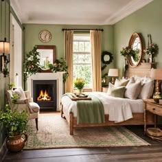 a bedroom with green walls and white bedding has a fireplace in the corner, surrounded by potted plants