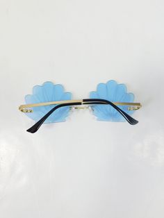 "Vintage Light Blue Tinted Gold Seashell Beach Big Sunglasses Fashion Hippie Standard Transparent Glasses Sunnies Uv400 This item is in new condition. UV400 Protection. Appropriate for any casual, or evening occasion. Material: metal and plastic Frame outer width: 5.5\" Length lens 2\" Thanks for looking! Domestic Shipping: 1st Class (2-5 days) I ship all items within 12-24 hours after payment received!! Find us on Instagram: @wearingmeoutvtg Find us on Facebook: wearing me out Find our website Blue Summer Sunglasses For Vacation, Blue Rimless Sunglasses With Uv Protection, Blue Polarized Sunglasses For Vacation, Blue Rimless Polarized Sunglasses, Blue Sunglasses With Uv Protection For Beach, Blue Sunglasses With Uv Protection For The Beach, Blue Sunglasses With Uva Protection For Vacation, Blue Rimless Sunglasses With Uva Protection, Blue Plastic Sunglasses For Summer