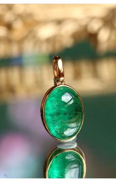 •Condition: Brand new•Center Stone: Natura Emerald from Zambia, Oval Shape, Cabochon Cut, 4.9ct, 13x10mm•Pendant Dimension: 21x20mm•Gold Weight: 1.5g•Metal Purity: Optional Each piece is made-to-order with care and special attention to detail. all items are made with conflict-free diamonds and gems.The item will be gift wrapped and shipped.---------------------------------------------------------Available in :14k Rose or Yellow Gold, White Gold18k Rose or Yellow Gold, White Goldand Platinumpleas Luxury Traditional Jewelry With Oval Cabochon, Luxury Classic Cabochons As Gifts, Luxury Engraved Oval Cabochon Jewelry, Classic Yellow Gold Cabochons As A Gift, Luxury Statement Jewelry With Oval Cabochon, Oval Gemstones With Bezel Setting In Fine Jewelry Style, Yellow Gold Oval Cabochon Jewelry, Classic Yellow Gold Cabochons For Gifts, Oval Cabochon Yellow Gold Jewelry