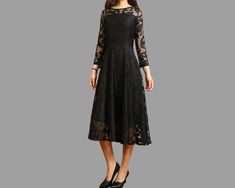 * A crew neck lace dress with 3/4 sleeves.  * A line shape and knee length.  * Materials: 50% cotton, 50% polyster Shop sizing chart FYI ( actual body figures, not laying flat clothes measurements) Size XXS (US 0, UK 2, German 30, French 32) Bust: fits bust around 31.5 inches/80cm Waist: fits waist around 25 inches/63cm Hips: fits hips around 35 inches/89cm Size XS (US 2, UK 6, German 32, French 34) Bust: fits bust around 33.5 inches/85cm Waist: fits waist around 26 inches/66cm Hips: fits hips a Fall Party Midi Dress With Half Sleeves, Black Spring Dresses 3/4 Length, Black 3/4 Length Spring Dresses, Black 3/4 Length Dresses For Fall, Chic Midi Dress For Party, Black Midi Lace Dress For Spring, Spring Dress With Lace Sleeves And Half Sleeve, Spring Party Dress 3/4 Length, Spring Party Dresses In 3/4 Length