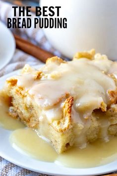 a piece of bread pudding sitting on top of a white plate