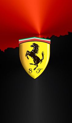 a ferrari logo is shown on the side of a red and black background with light coming from behind it