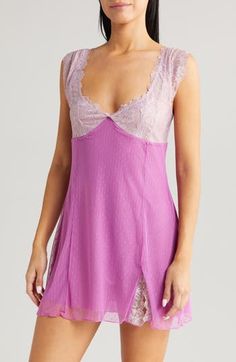 Exude elegance through your morning and nighttime routines in this luxurious dotted-mesh chemise winked with crisscrossed straps and intricate lace accents. 22" length Deep V-neck Adjustable straps Partially lined 82% nylon, 18% spandex Hand wash, line dry Imported Coquette Fitted Nightgown With Built-in Bra, Fitted Coquette Nightgown With Built-in Bra, Lace V-neck Camisole, Coquette Lace V-neck Nightgown, Sheer V-neck Coquette Sleepwear, Sheer Lace V-neck Nightgown, Fitted Lace V-neck Chemise, Sheer Lace V-neck Sleepwear, Fitted Sheer Sleepwear For Loungewear