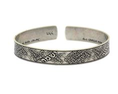 "Silver cuff stack bracelet for women and men, Hebrew religious Jewish bracelet, Judaica Jewish jewelry engraved with Shir Lamaalot chant. A unisex cuff bracelet that is comfortable and easy to wear engraved with Hebrew words. On the outer side of the bracelet, embossed in a unique pattern the Jewish verse: יְהוָה, יִשְׁמָר-צֵאתְךָ וּבוֹאֶךָ.\" \"מֵעַתָּה, וְעַד-עוֹלָם \"The Lord will watch over your coming and going, both now and forevermore.\" It is a double blessing: God will watch over you f Adjustable Engraved Bangle Bracelet, Spiritual Friendship Cuff Bangle Bracelet, Spiritual Friendship Cuff Bracelet, Silver Spiritual Bracelets For Friendship, Personalized Spiritual Bangle Bracelet, Spiritual Engraved Bracelets For Friendship, Symbolic Stamped Cuff Bracelet, Spiritual Bangle Bracelets For Blessing, Silver Band Wristband As Gift