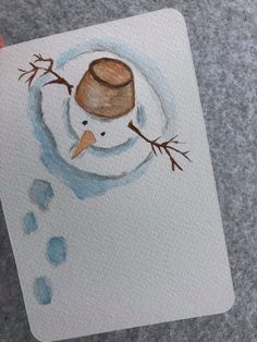 a drawing of a snowman with a hat on