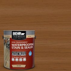 a can of waterproofing stain and sealer on a wood floor with the lid open