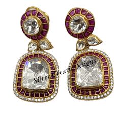 Sterling Silver Moissanite Polki Diamond Earrings, Ruby Drop Earrings, Dainty Gift for Her, Antique Indian Earrings About Product :- Product Code :- SC-SPE-1282 Product Location:- Jaipur, India Gross Weight :-36.500 Grams Gemstone Used :- Synthetic Moissanite, Ruby ( Lab Made ) Gemstone Color :-  White, Red Dimensions :- 3 Inch Plating :- Gold Plating Over Silver Please let us know if you required in other gemstones which is also possible. We are continuously adding new products in our store. So Designer Diamond Earrings For Wedding, Designer Diamond Wedding Earrings, Elegant Festive Earrings With Single Cut Diamonds, Elegant Single Cut Diamond Earrings For Festive Occasions, Ruby Drop Earrings, Victorian Style Rings, Wedding Jewelery, Kundan Jewellery Bridal, Polki Earrings