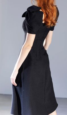 Show Off Your Edgy Side in This Contemporary Midi Dress Combining Patchwork Panels, a Fitted Silhouette and a Waist-Tie Bow. Strategically Placed Color Blocking Creates the Illusion of an Enviable Hourglass Shape. The Lightweight Stretch Fabric Allows for Dancing and Mingling With Ease. Make a Bold Entrance in This Modern Black Magic. Gentle Dry Clean Only Colour may vary due to lighting on images. The product images (without model) are closest to the true colour of the product.Item runs true to Black A-line Midi Dress With Fitted Bodice, Elegant Square Neck Mini Dress For Work, Fitted Knee-length Mini Dress For Formal Occasions, Tailored Black Mini Dress For Formal Occasions, Black Tailored Mini Dress For Formal Occasions, Tailored Black V-neck Dress, Tailored Mini Length Evening Dresses, Tailored Knee-length Mini Dress For Formal Occasions, Elegant Fitted Mini Dress With Short Sleeves