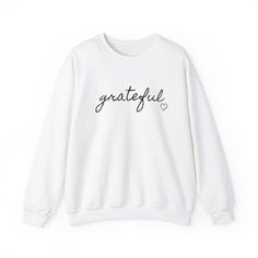 🌟 Dress in Gratitude Every Day with Our Minimalist 'Grateful' Sweatshirt – Where Simplicity Meets Serenity! 🍂 Elevate your everyday style with our 'Grateful' sweatshirt – a chic, minimalist masterpiece designed to remind you of life's beautiful moments. This isn't just clothing; it's a cozy expression of gratitude, perfect for embracing the simple joys that make every day special. ✨ 👚 Gratitude, Inspirational Shirt, Women Shirt, Ink and Quotes, Gratitude Shirt, Minimalist Shirt, Cute Gratitud Cozy Fit Long Sleeve Top With Letter Print, Comfortable White Long Sleeve T-shirt, White Top With Graphic Print And Cozy Fit, Trendy White Cozy Fit Top, White Letter Print Cozy Fit Top, White Cozy Fit Tops With Letter Print, White Cozy Fit Top With Letter Print, Comfortable Fit Crew Neck Winter Tops, Comfortable Fit Crew Neck Tops For Winter