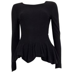 Alexander McQueen long sleeve peplum sweater in fine knit wool (assumed as tag is missing) with round neck. Unlined. Has been worn and is in excellent condition. Tag Size Missing Tag Size S Shoulder Width 39cm (15.2in) Bust 76cm (29.6in) to 78cm (30.4in) Waist 64cm (25in) to 66cm (25.7in) Hips 90cm (35.1in) to 92cm (35.9in) Length 66cm (25.7in) Side Seam Length 46cm (17.9in) Sleeve Length 62cm (24.2in) Fine Knit Long Sleeve Top For Evening, Fitted Crew Neck Sweater For Evening, Fitted Fine Knit Long Sleeve Sweater, Fitted Long Sleeve Fine Knit Sweater, Fitted Long Sleeve Sweater For Work, Fitted Fine Knit Long Sleeve Top, Peplum Sweater, Black Wool, Fashion Designers