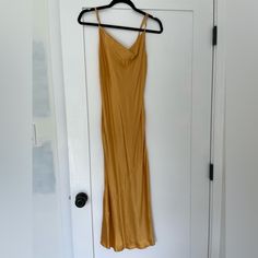 Marigold Colored Midi Dress With Cowl Neckline, Adjustable Straps And Bias Cut Skirt That Drapes Curves! Nwt - I Bought This For A Wedding And Never Wore Yellow Fitted Midi Slip Dress, Fitted Yellow Slip Dress Midi Length, Yellow Midi Length Slip Dress For Party, Yellow Midi Length Slip Dress, Gold Sleeveless Silk Midi Dress, Gold Silk Sleeveless Midi Dress, Gold Midi Dress For Brunch, Gold Fitted Maxi Length Slip Dress, Summer Gold Silk Maxi Dress