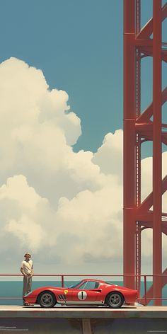 a man standing next to a red sports car in front of the golden gate bridge