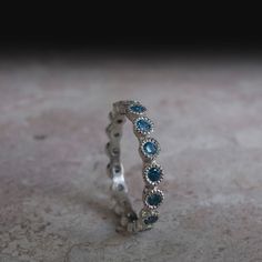 London Blue Topaz Ring - Eternity ring - Light Blue stone - Something blue Blue Diamond Stackable Round Rings, Blue Diamond Round Stackable Rings, Stackable Blue Topaz Round Rings, Blue Diamond Stackable Rings With Round Shape, Anniversary Blue Topaz Ring With Round Stone, Blue Diamond Stackable Promise Ring, Blue Topaz Anniversary Ring, Blue Stackable Diamond Promise Ring, Stackable Round Blue Topaz Rings