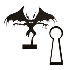 an image of a key with a demon on it