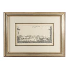 a framed drawing of a cityscape