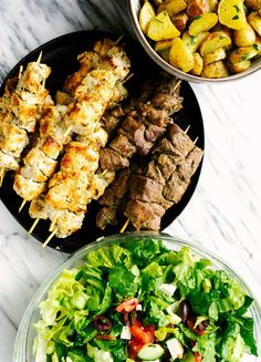 three plates filled with different types of food on top of a table next to each other