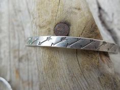 Arrow bangle bracelet...5mm wide, handmade in sterling silver 925....the bracelet is 2 3/8" in diameter, which is between a small and medium bracelet......great looking with an American Indian look.S - 2 1/4 inches (57mm)M - 2 1/2 inches (64mm)L - 2 3/4 inches (70 mm) Sterling Silver Etched Bangle Bracelet, Etched Sterling Silver Bangle, Etched Sterling Silver Bangle Bracelet, Sterling Silver Etched Bangle, Stamped Sterling Silver Bangle Bracelet, Stamped Sterling Silver Bangle, Unique Stamped Sterling Silver Bangle, Indian Look, Bracelet Handmade