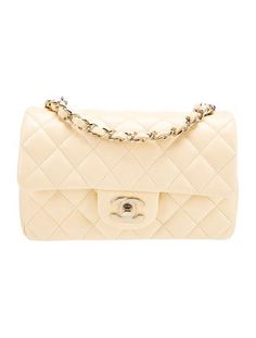 Chanel Shoulder BagFrom the 2020 Collection by Virginie ViardYellow LambskinInterlocking CC Logo, Quilted Pattern & Chain-Link AccentGold-Tone HardwareChain-Link Shoulder StrapsChain-Link Accents & Single Exterior PocketLeather Lining & Dual Interior PocketsTurn-Lock & Flap Closures at FrontIncludes Authenticity Card Classic Mini, Flap Bag, Chain Link, Chanel Classic, Quilt Patterns, Women Handbags, Chanel, Handbags, Shoulder Bag