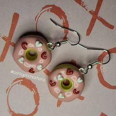 Valentine Donut Earrings Donuts measure approximately between 1.5cm to 2.25cm Materials: ▫ Polymer Clay ▫ Hypoallergenic Hanging Earring Hook Each Donut is handmade by me, so you may receive a pair of earrings that are slightly different from the ones pictured in the listing. As they are all made by hand all are similar but no two pairs will ever be the same! I can also do custom orders. Please feel free to send me a message with any questions or ideas! Thanks for checking out my shop! Cute Sterling Silver Hoop Earrings, Cute Nickel-free Round Hoop Earrings, Cute Hypoallergenic Round Hoop Earrings, Gift Polymer Clay Small Hoop Jewelry, Sweet Handmade Polymer Clay Jewelry, Handmade Sweet Polymer Clay Jewelry, Sweet Handmade Resin Jewelry, Handmade Sweet Resin Jewelry, Circular Polymer Clay Jewelry Gift