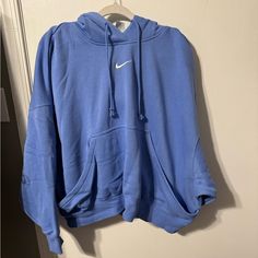 Slightly Cropped Xl Nike Hoodie- Nwot Never Worn. Pretty Blue Color Nike Hoodie With Pockets For Fall, Nike Sweater For Winter Loungewear, Nike Casual Spring Sweater, Light Blue Crew Neck Hoodie For Spring, Nike Relaxed Fit Hoodie For Winter, Oversized Nike Hoodie Sweatshirt, Nike Relaxed Fit Winter Hoodie, Nike Winter Sweater For Loungewear, Blue Athleisure Sweatshirt For Winter